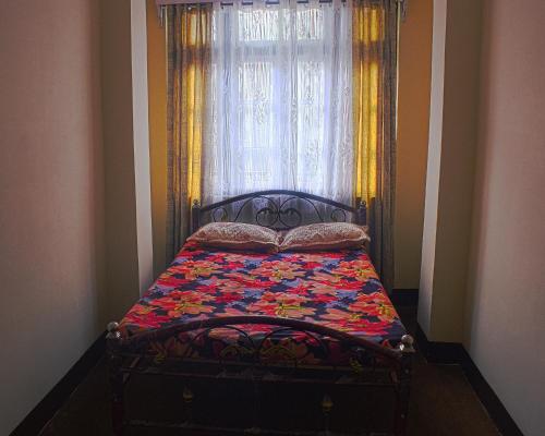 Apartment with Balcony room in DukeRaj Homestay