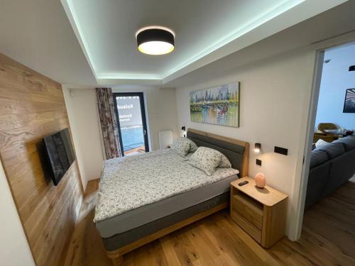 Luxusní apartmán GRAND v centru Harrachova se saunou, wallboxem EV, parkováním zdarma, Netflix a HBO, velkým balkonem a výhledem na Čertovu horu ,sjezdovku a skokanské můstky Luxusní apartmán GRAND v centru Harrachova se saunou, wallboxem EV, parkováním zdarma, Netflix a HBO, velkým balkonem a výhledem na Čertovu horu ,sjezdovku a skokanské můstky