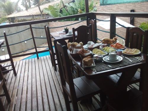 Food and beverages, Pousada Reserva do Tombo Lounge Hostel near Marcao Pier Chopp