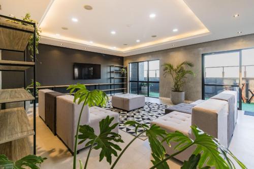 Shared lounge/TV area, Century Park by My Way in Porto Alegre