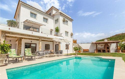 Amazing Home In Mezquitilla With 4 Bedrooms, Outdoor Swimming Pool And Swimming Pool