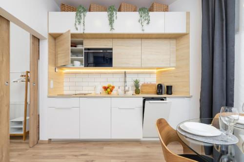 Underground Apartment Bogdańskiego Residence by Renters