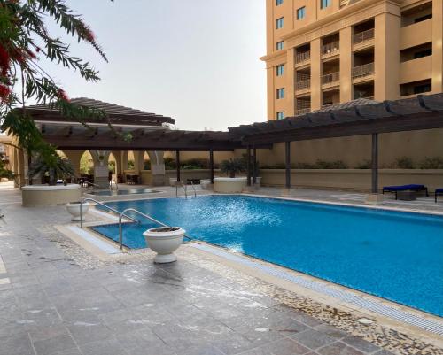 Swimming pool, Alken Studio - Amazing Superior Studio with Marvellous Marina View in the Pearl, Doha in The Pearl