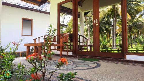 ระเบียง/ชานเรือน, ซันเซ็ต สปริงส์ บีช รีทรีต (Sunset Springs Beach Retreat) in กังกา