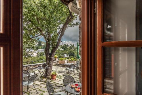 Dārzs, Nymfes Hotel in Nymfaio
