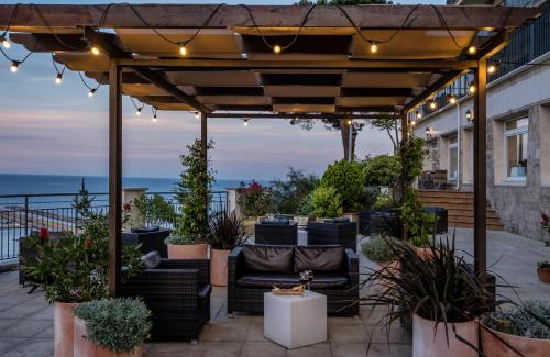 شرفة/ تراس, Hotel Montjoi by Brava Hoteles in سان فيليو دي غيشول