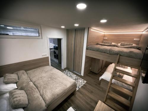 U Králíka, přízemní bezbarierové apartmány A,B,C,D - 50 metrů od vleku - přejdete v lyžácích, pod bobovou dráhou, parkování zdarma, lyžárna s vysoušeči bot,, Dolní Morava
