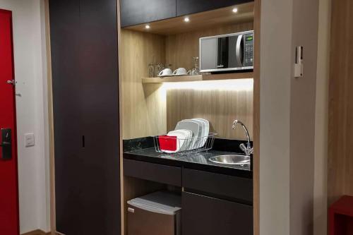 virtuve, Ramada Encore by Wyndham Guadalajara Aeropuerto in Las Pintas