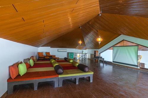 Saffronstays Casa Del Palms, Alibaug - luxury pool villa with chic interiors, alfresco dining and island bar