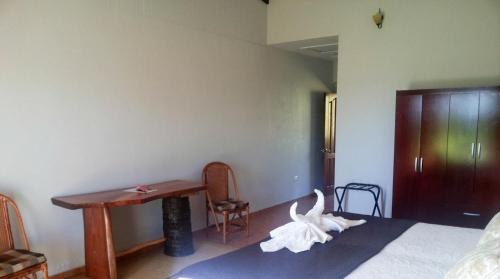 Chambre triple, vue sur la mer