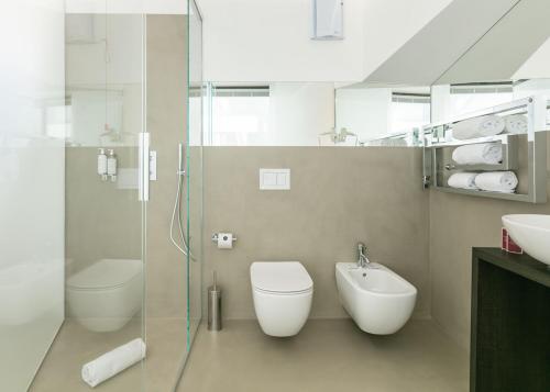 DOMUS CAVOUR Rooms&Suites - Tap to explore photos
