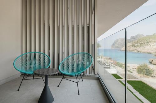 Chambre double avec 1 ou 2 lits, signature, vue partielle sur la mer, terrasse