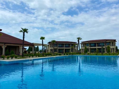 Peldbaseins, Anaklia Resort by Pratap's Signature in Ganarjiis Mukhuri