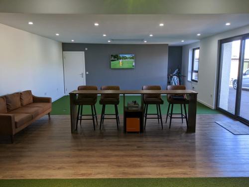 Golfers dream Guest suite with onsite golf studio available for booking by guests