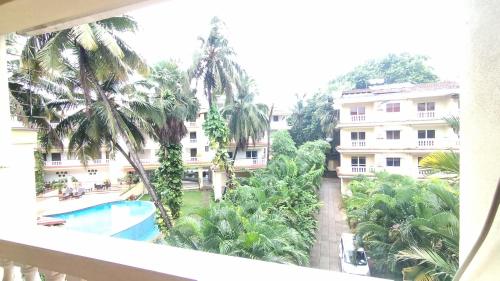 Seacoast Retreat- Lovely 2 BHK apartment with pool