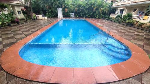 Seacoast Retreat- Lovely 2 BHK apartment with pool