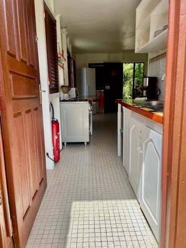 Kitchen, Gites dans un jardin in Terre-de-Haut