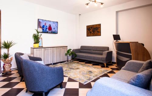 Közös társalgó / TV, Homelike Guest house in Girne