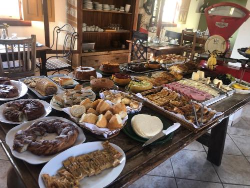 مطعم, Pousada Vó Iris - Tiradentes Mg (Pousada Vo Iris - Tiradentes Mg) in تيرادينتيس