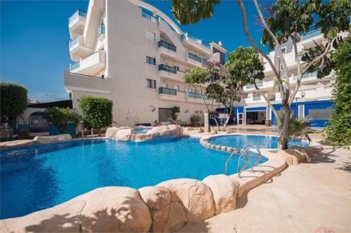 Beautiful location in Cabo Roig with a private roof top terrace at Playamarina II