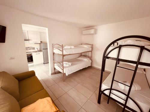 1 queen bed, 2 bunk beds, 1 sofa bed