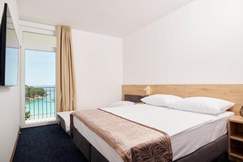 Family Room with Sea View and Balcony