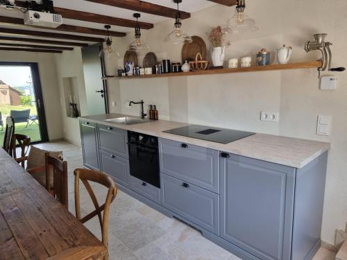 Közös társalgó / TV, Haus am Berg mit Wellnessbereich, Bar und Panorama in Buhlertal