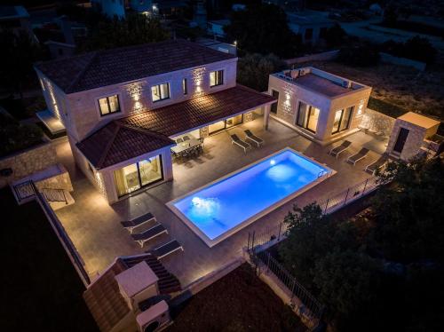 NEW! Stylish Villa Neven with 44sqm heated private pool, 4 en-suite bedrooms, 2 living and dining areas, wine cellar