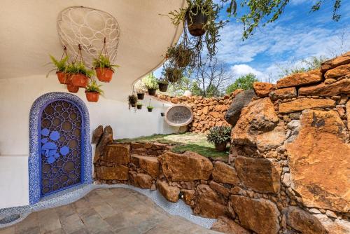 SaffronStays AsanjA Titaly, Murbad - hobbit inspired earth-shelter home with plunge pool