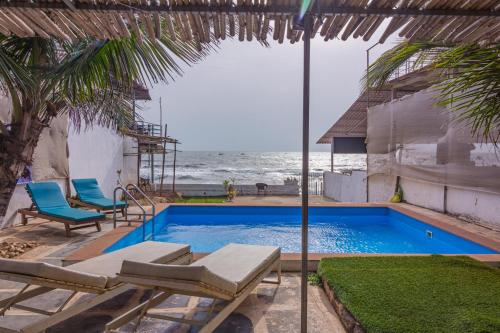 Beachfront pool villa Myconos Goa