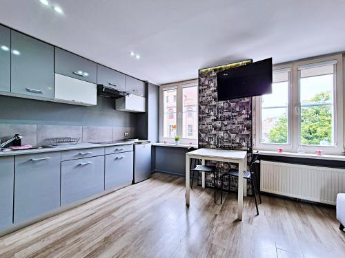 Apartament z widokiem na pomnik Kopernika - Rynek Staromiejski