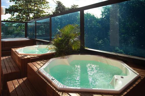 Jardín, Hotel Jurere Beach Village - OFICIAL in Florianopolis