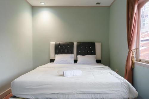 Asokatama Residence Syariah Mitra RedDoorz - Tap to explore photos