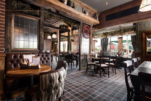 Ресторан, The Hog's Head Inn - The Inn Collection Group in Олнуїк