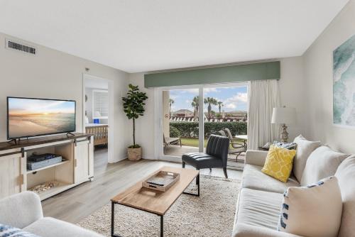 Islander 107 - Great for families just steps away from the pool and beach! - main image