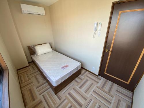 Single Room with Shared Shower and Toilet