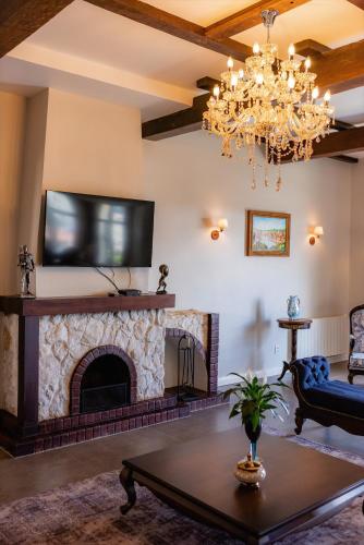 Koplietošanas atpūtas telpa ar TV, Castelo Boutique Hotel in Fraiburgo