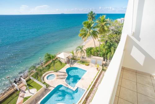 Beachfront Penthouse with Ocean and Sunset Views at Pelican Reef #703, Rincón