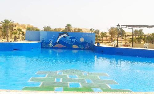Swimming pool, شاليه رائع مجدد للعائلات فقط باندلسيه مطروح in Marsa Matruh