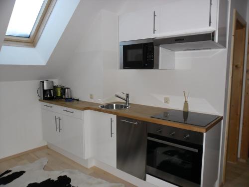 廚房, 奧斯切爾巴爾家庭公寓 (Familienappartement Otscherbar) in 拉肯賀夫岩奧特舒耶