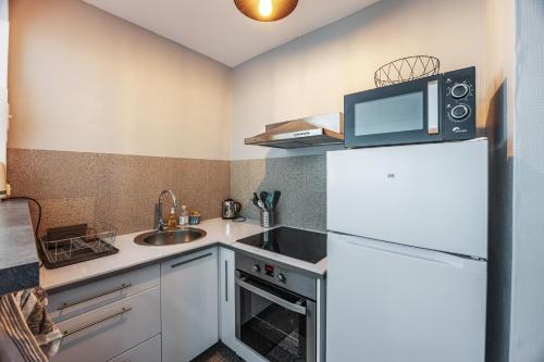 virtuve, La Tortue Joyeuse - Appartement avec Loggia in Bernieres-sur-Mer