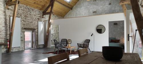 Shared lounge/TV area, Le Pas du Loup in Peyrat-le-Chateau