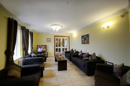 Koplietošanas atpūtas telpa ar TV, Seaview Guesthouse in Rostrevor