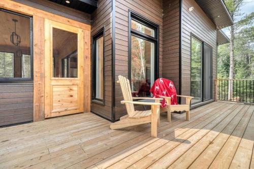 Le Grand Duc- SPA- Kayaks- bord Rivière Noire- VTT- Motoneige- Randonnée (Le Grand Duc- SPA- Kayaks- bord Riviere Noire- VTT- Motoneige- Randonnee) in St Zenon (QC)