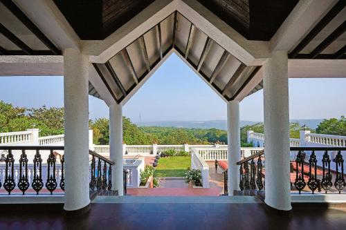 Ananda Villa by StayVista - A serene escape with Mountain-view, Heritage interiors, Swimming pool & Lush lawn