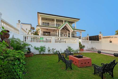 Ananda Villa by StayVista - A serene escape with Mountain-view, Heritage interiors, Swimming pool & Lush lawn
