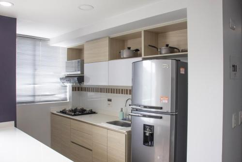 Kitchen, Apartahotel Millennials in Ecoturistico Cerro de Orro