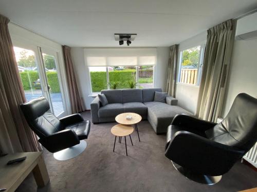 Nice chalet with garden in Friesland in Tzummarum