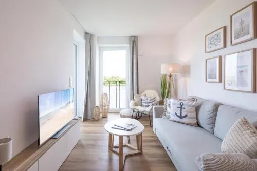 Apartment N14 direkt am Nordseedeich mit Blick auf den See in Nordstrand, Deutschland