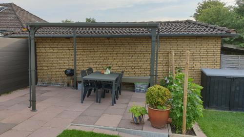 Viesnīcas āriene, Ferienwohnung Am Runenstein 7 in Busdorf (Schleswig-Holstein)
